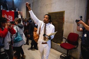 State Representative Justin Jones leaving the Tennessee House chamber after being expelled for leading a gun-control protest on April 5, 2023. [Credit: Jon Cherry for The New York Times]